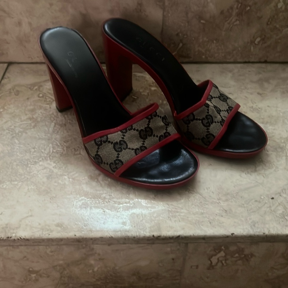 Gucci retro heels: Red with monogram logo, U.S. Size 7 1/2….3 3/4 inch heel.